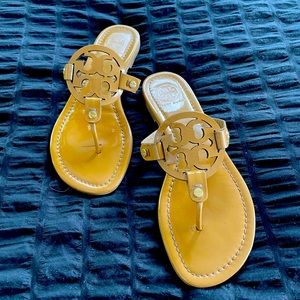 Tory Burch’s Miller tan leather sandals.
